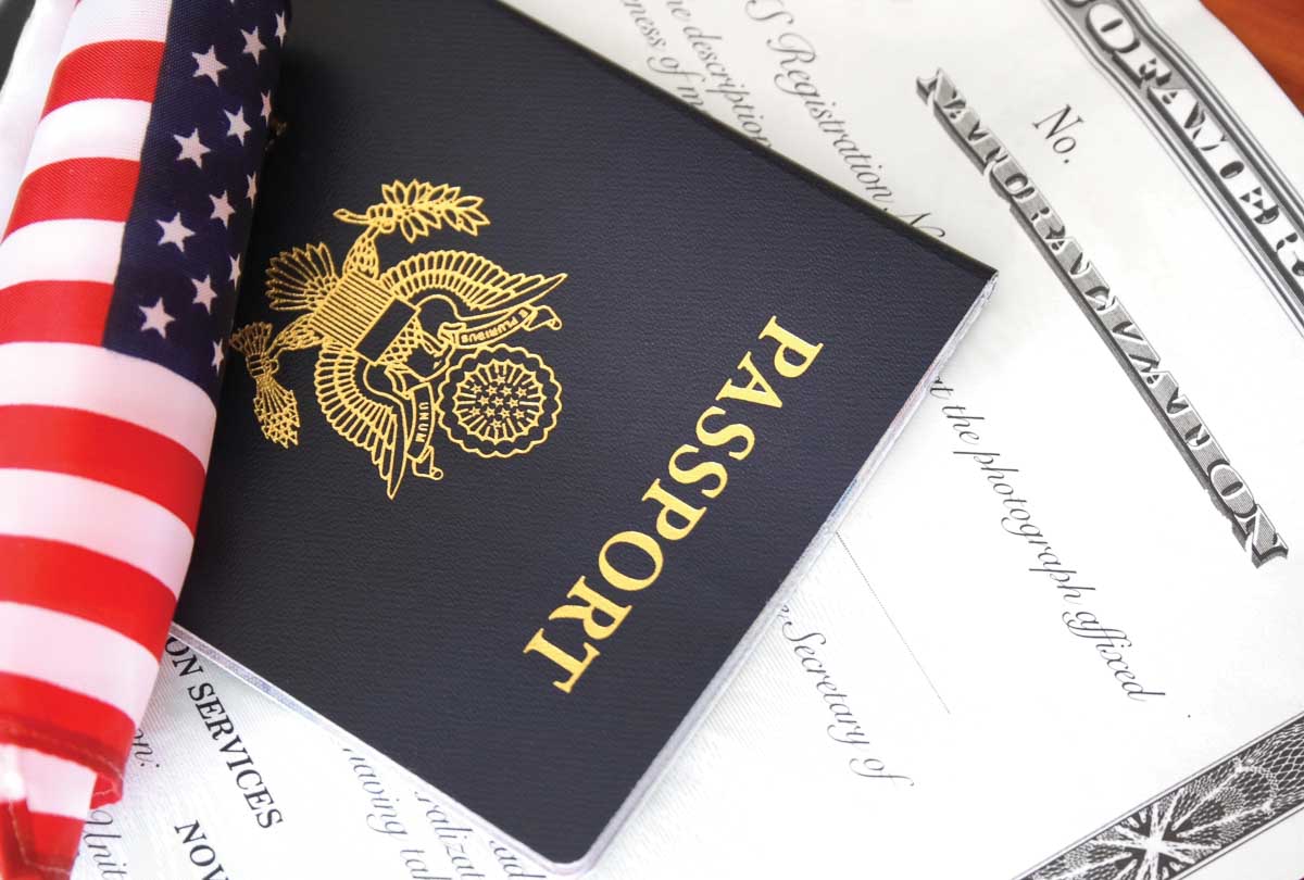 Passport under small flag and above official document
