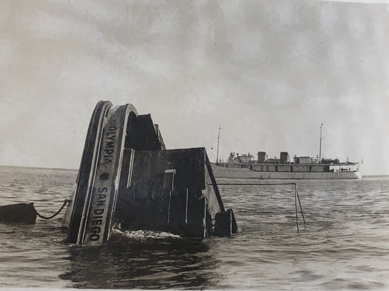 A photo of a ship sinking - taken from Hancock's collections